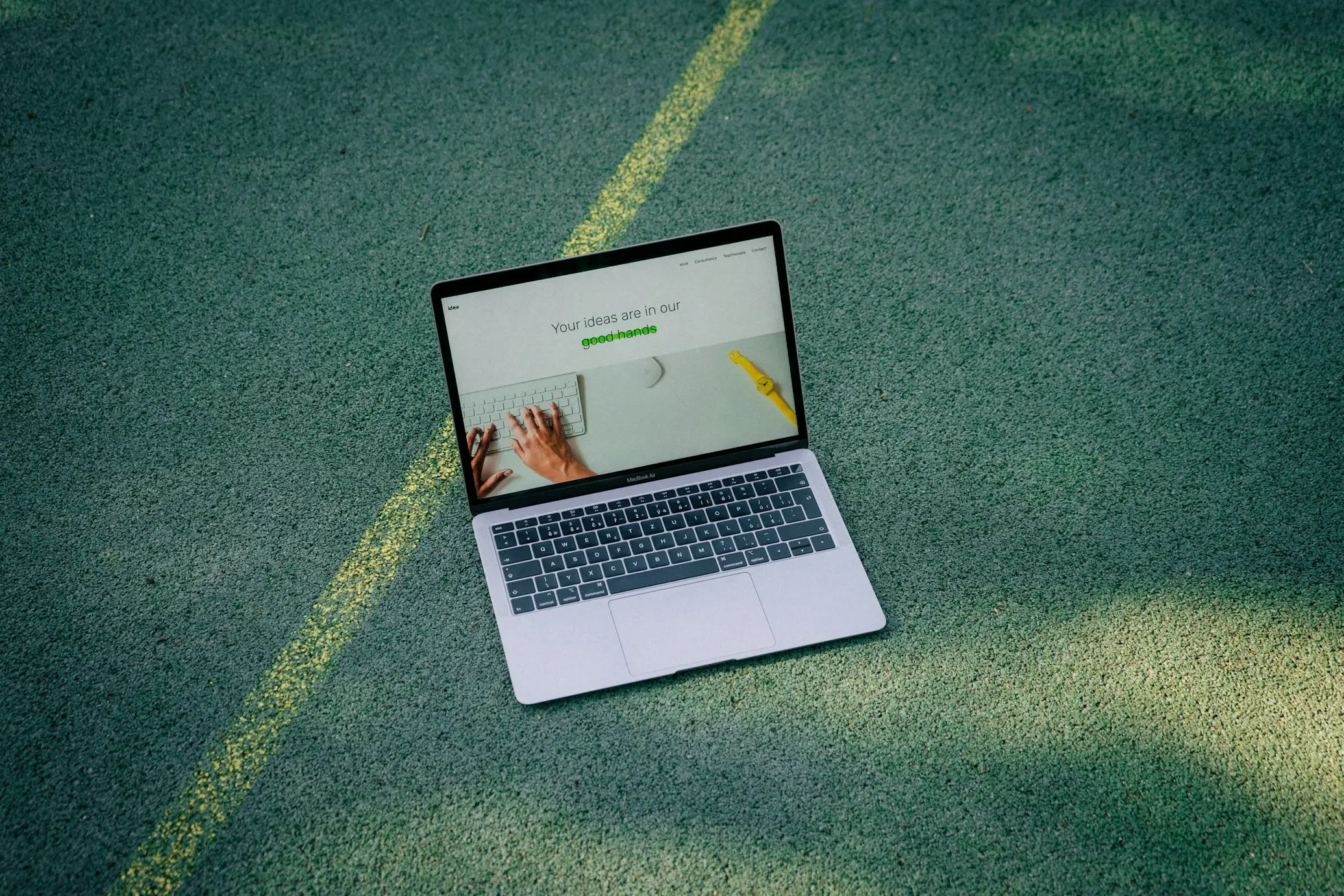Laptop displaying a website project